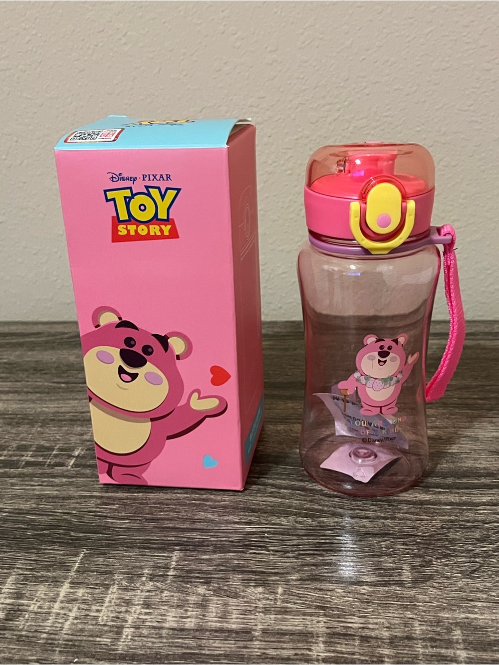 Disney Toy Story Lotso Pink and Yellow Kids Water Bottle with Strap